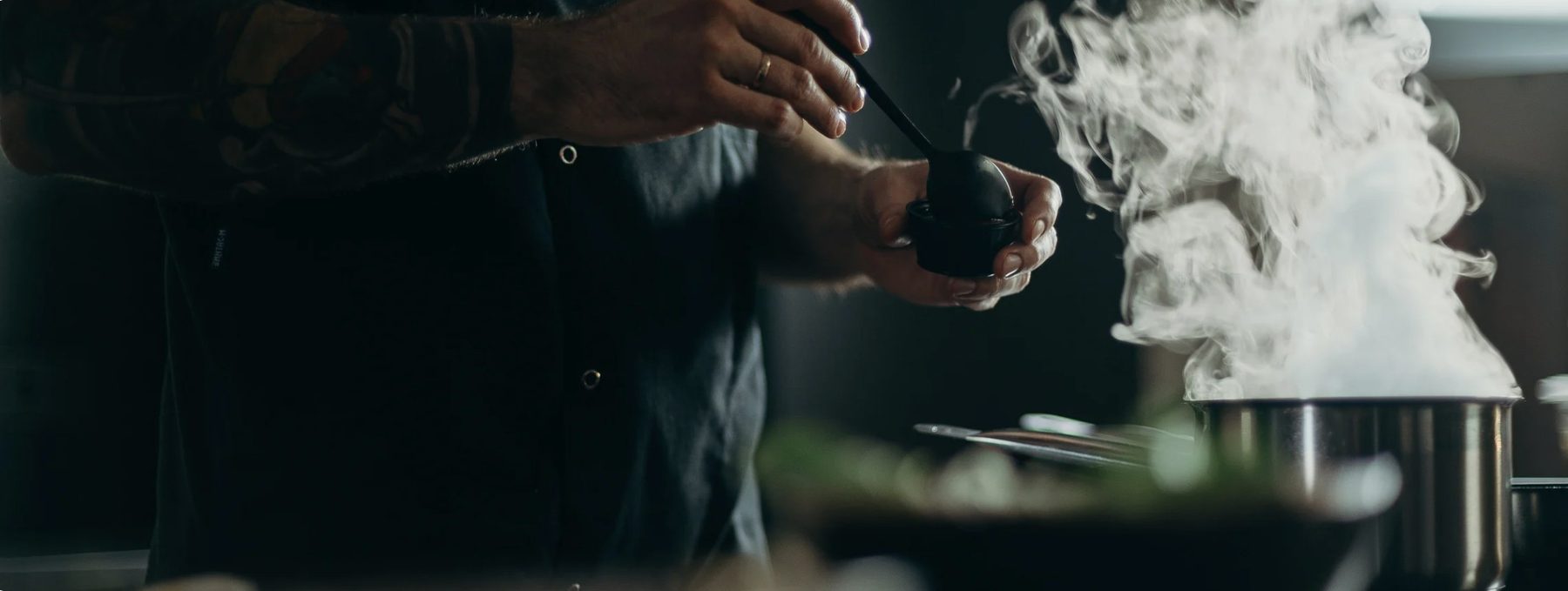 TFFC live cooking show with chefs plating in front of guests